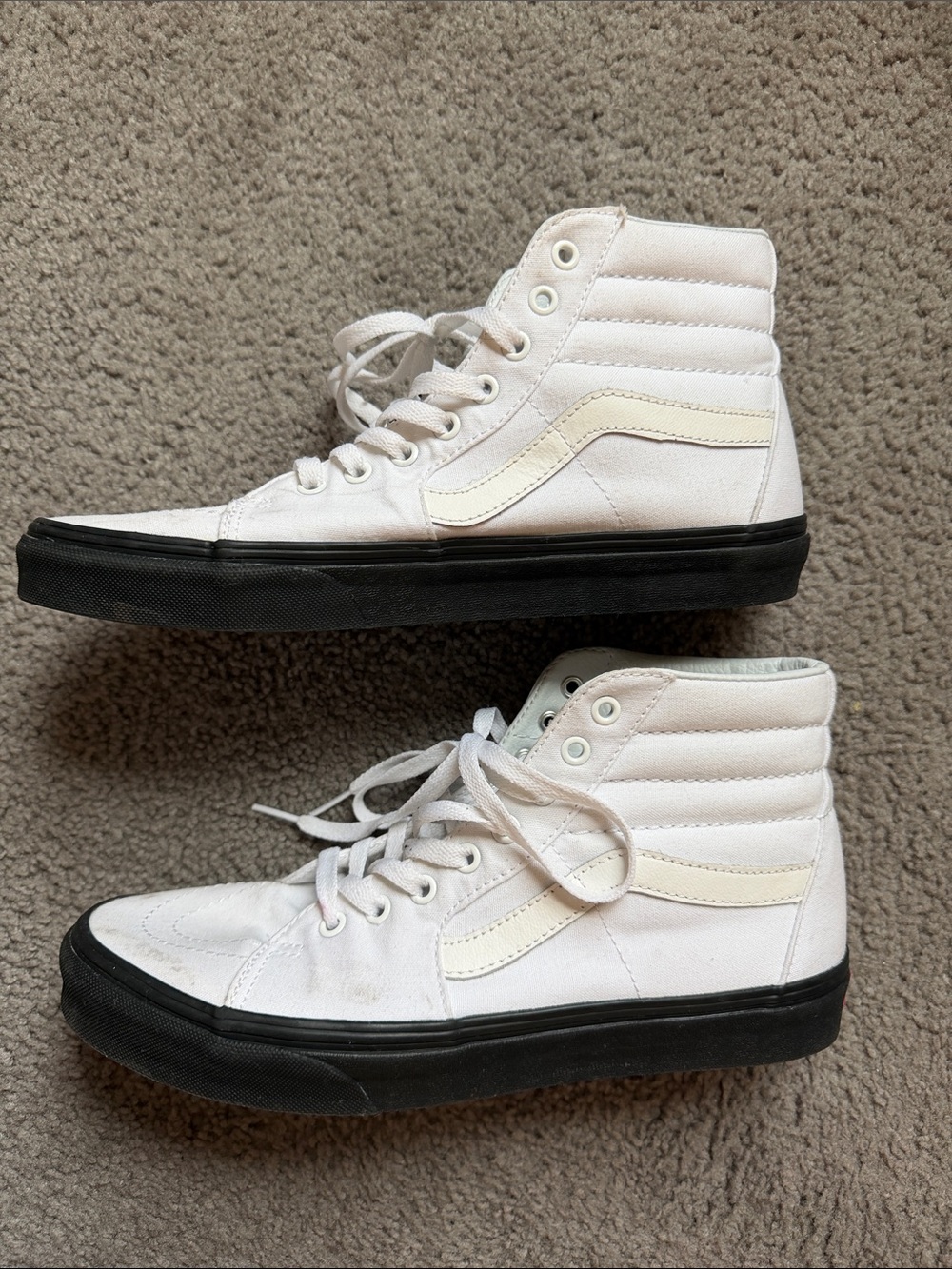 Vans White High-Top Sneakers with Black Sole